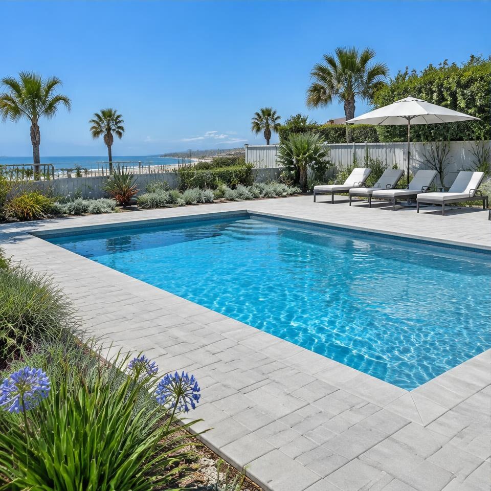 Concrete paver pool deck design inspiration for Oxnard, California homes