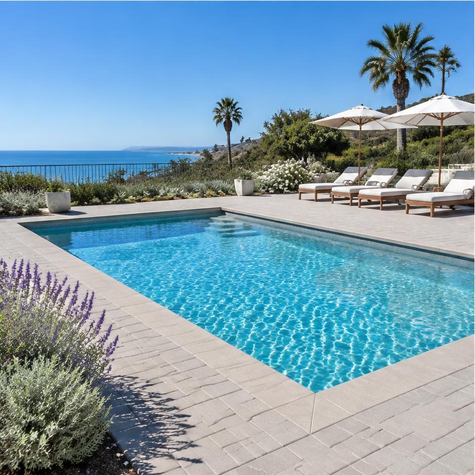 Concrete paver pool deck design inspiration for Santa Barbara, California homes